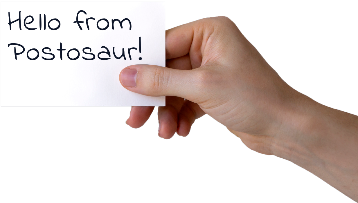 Hand holding a Postosaur postcard